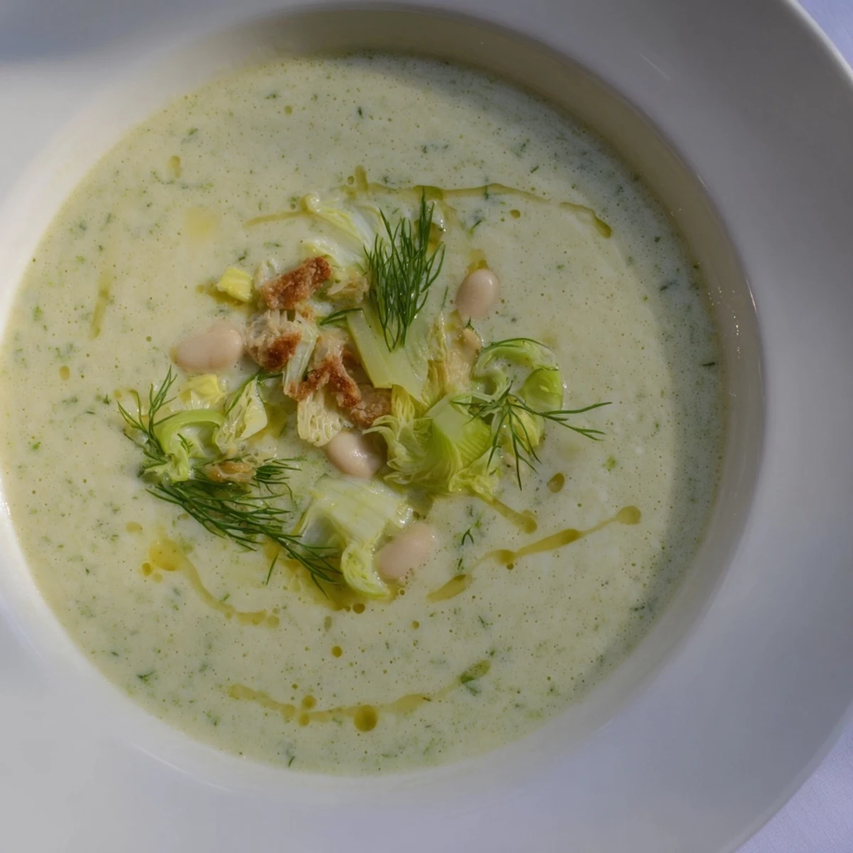 A bowl of Simple White Bean and Fennel Soup, showing hearty vegetables and the rich, brothy base.