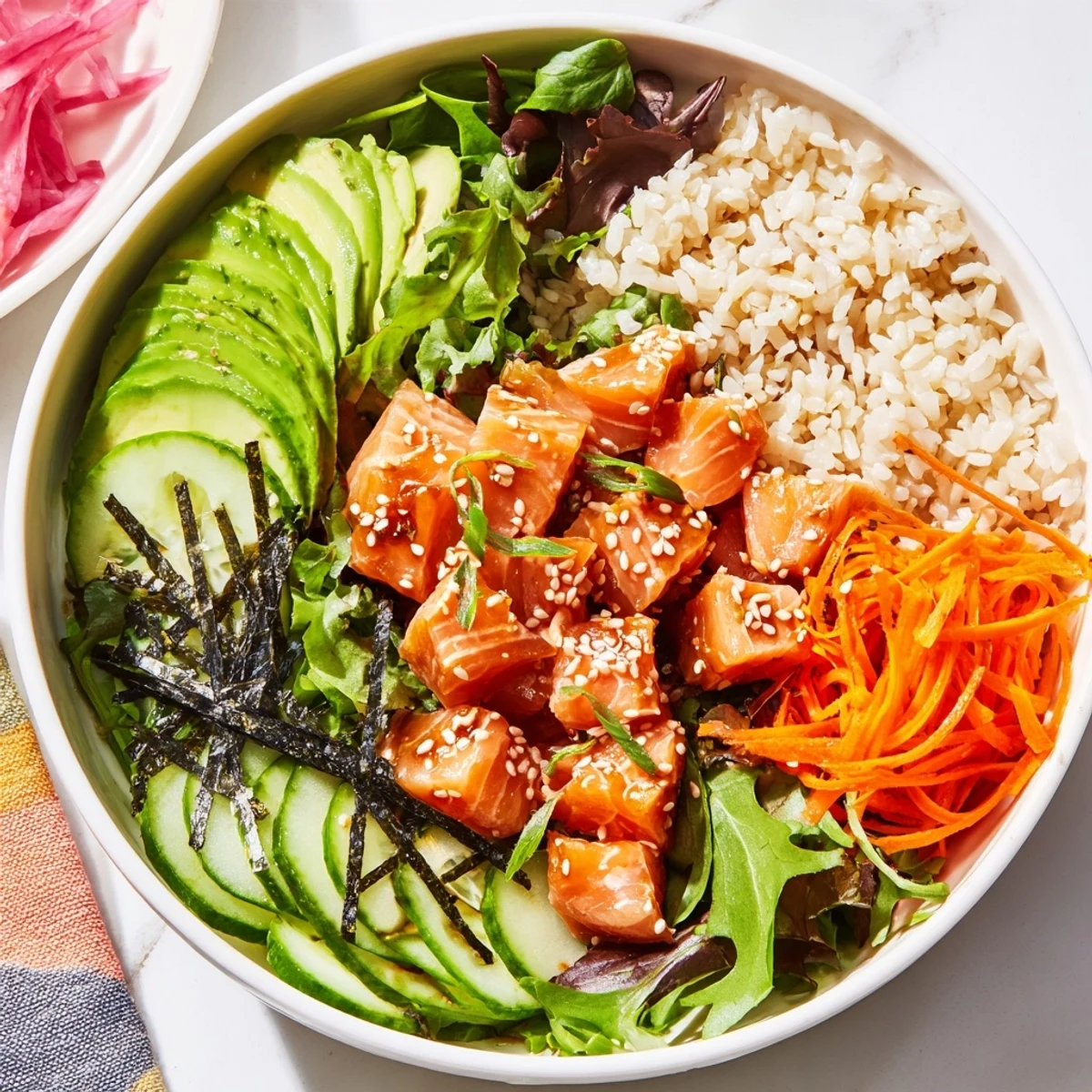 Close up view of a colorful, fresh Poke Bowl Salad with a delicious soy-ginger dressing ready to eat.