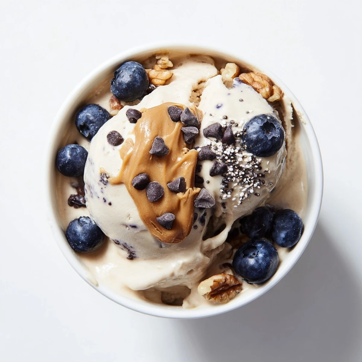 Creamy Protein Ice Cream Bowl with fresh berries, perfect healthy snack after a workout.