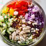 Vibrant image of a Layered Holiday Chopped Chicken Salad Jar, ideal for easy, delicious meal prep.