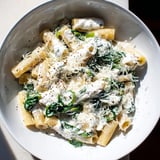 A steaming dish of Whipped Ricotta & Spinach Baked Pasta, perfect for a cozy, comforting, cheesy dinner entree.