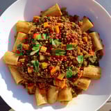 Hearty and flavorful High-Fiber Lentil Bolognese, a festive pasta dish perfect for a cozy Christmas dinner.