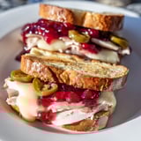 Melting Swiss cheese and spicy jalapeños star in this Air Fryer Jalapeño Cranberry Turkey Grilled Cheese sandwich.