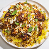 A close-up shot of rich and delicious Kuwaiti Biryani rice, showcasing layers of rice and flavorful meat.