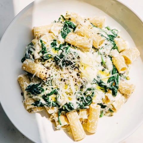 Whipped Ricotta & Spinach Baked Pasta, topped with melted mozzarella and golden brown cheese, looks delicious.