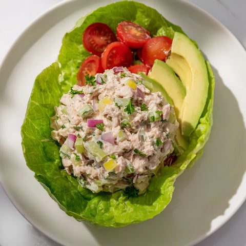 Fresh tuna salad lettuce wraps, filled with creamy tuna, ready for a delicious, light lunch.