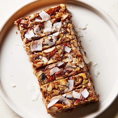 Deliciously sweet no-bake coconut date bars, perfect for snacking anytime or dessert.  