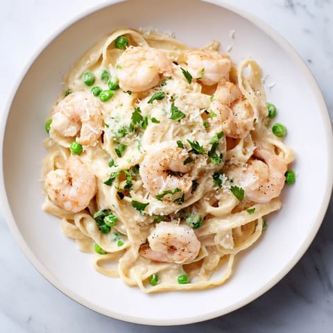 A close-up of cheesy Instant Pot Shrimp Alfredo Pasta, perfect for a fast and delicious dinner tonight.