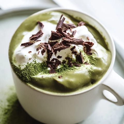 Rich, dark Matcha Hot Cocoa Protein Mug, a quick and delicious high-protein breakfast option.