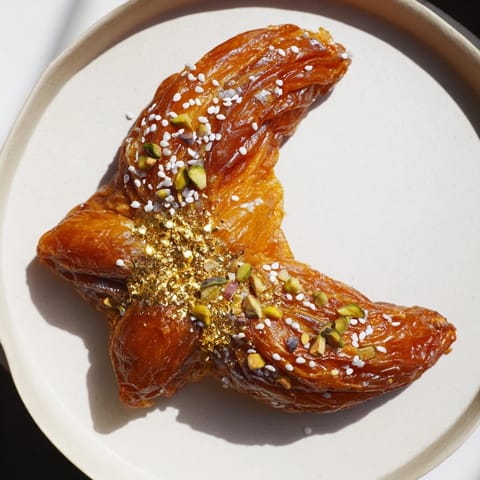 Beautifully arranged Lunar and Star Date Platter, filled with nuts and citrus, ready to enjoy as a dessert.