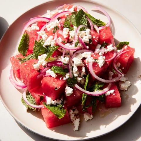 A visually appealing Watermelon Feta Salad: a delicious, summery Mediterranean delight.