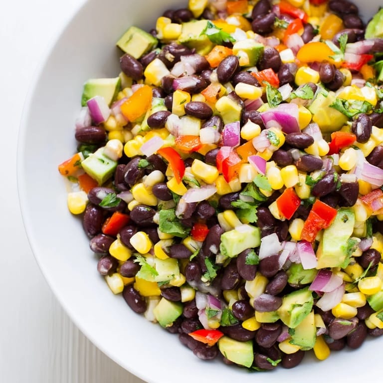 Close-up of a refreshing Southwest Black Bean Salad: a vegetarian delight with a zesty, tangy flavor.