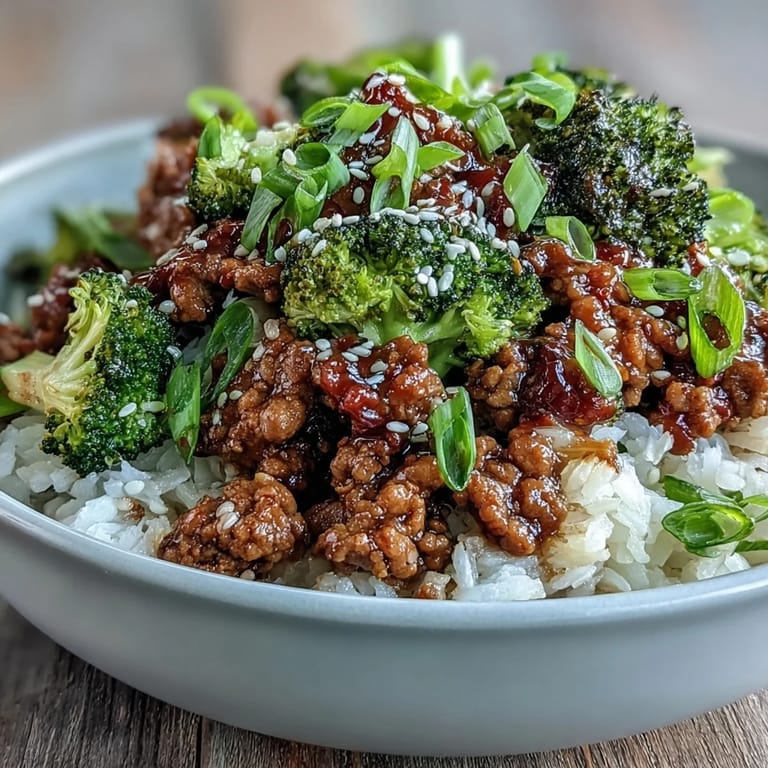 Garnished with fresh green onions, this meal-prep friendly bowl offers a sweet heat and savory aroma.